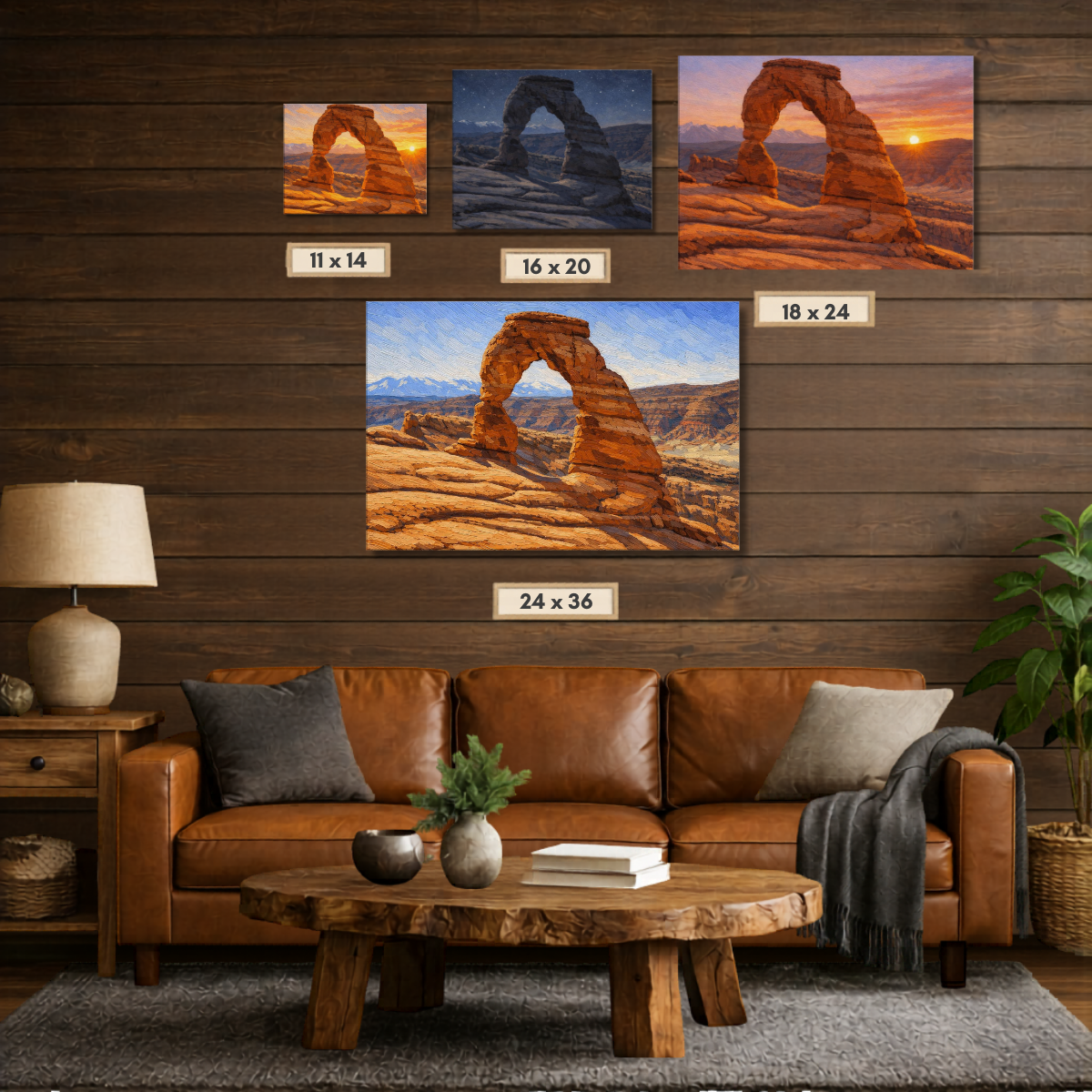 Living room with a brown leather sofa, wooden coffee table, and wall art of Utah Arch landscape in four different sizes.
