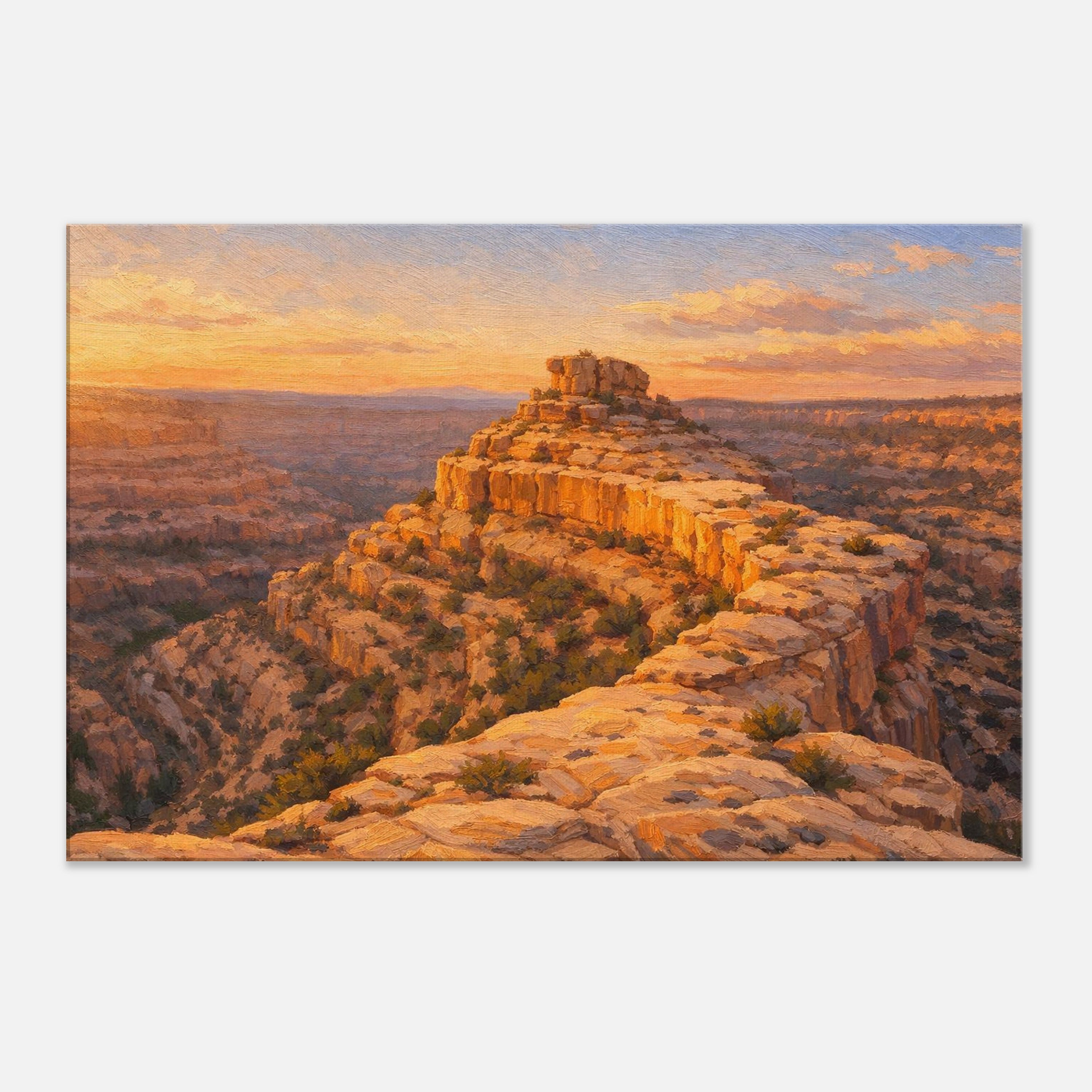 Sunrise over a rocky landscape with a prominent rock formation.