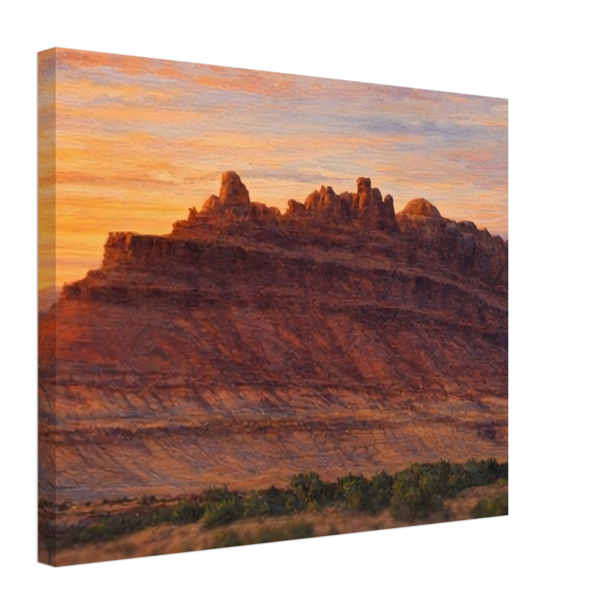 Canvas print of a desert landscape with rocky formations and a warm sunset sky.