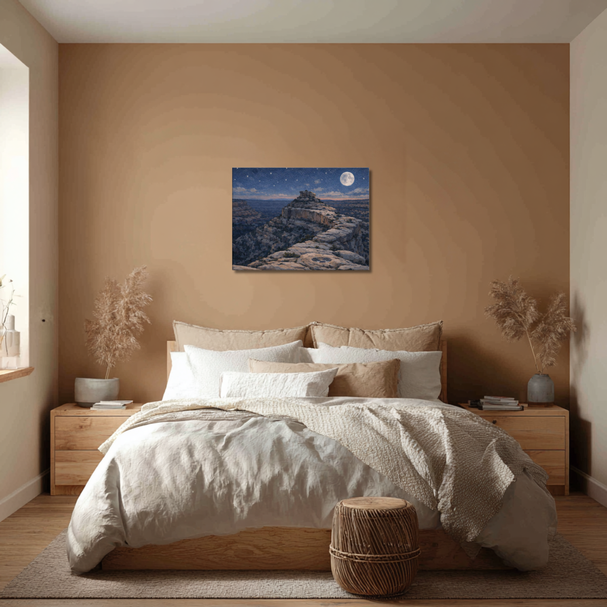 Canvas wall art of the Bears Ears Cliffs from Cedar Mesa at night displayed in a modern bedroom, above a cozy neutral bed with natural light and clean contemporary décor.