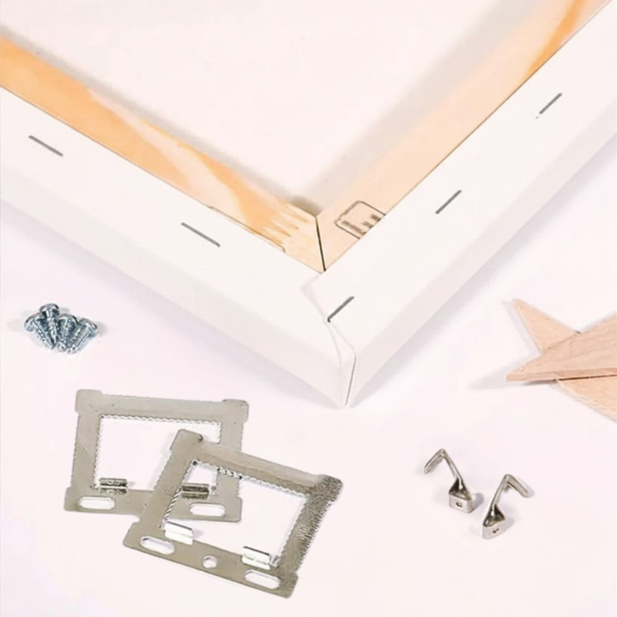 Wooden Canvas Frame and wall hanging components on a white background