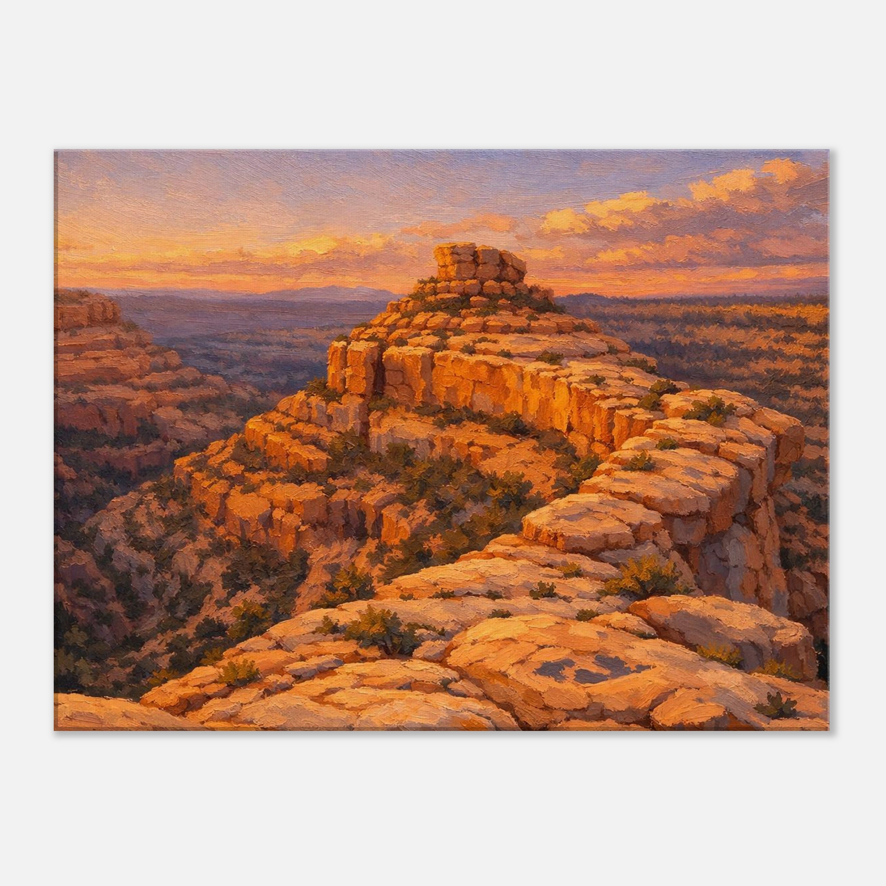 Sunset over a desert landscape with rocky formations